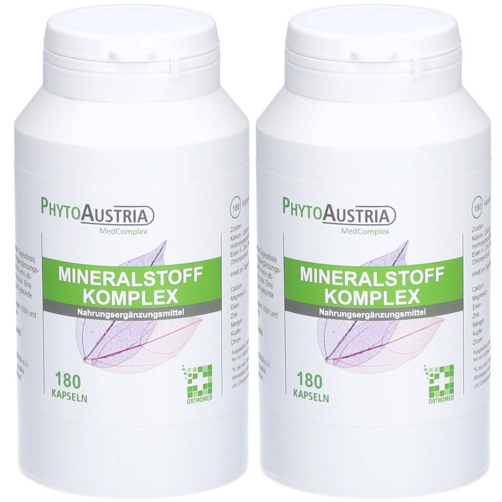 Zwei weiße Flaschen mit Schraubverschluss. Aufschrift: MINERALSTOFF KOMPLEX, Nahrungsergänzungsmittel, 180 Kapseln. Marke: PhytoAustria.