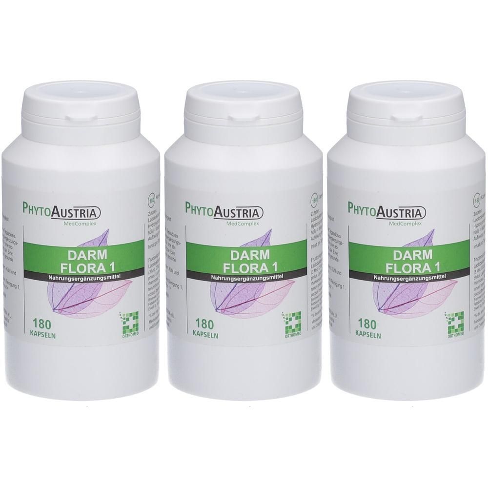 Drei weiße Flaschen mit Deckel. Auf jeder Flasche steht "PhytoAustria Darm Flora 1" und "180 Kapseln".