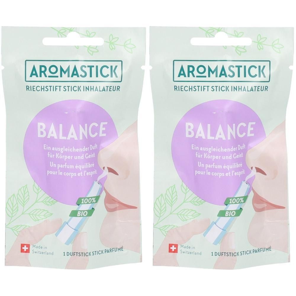 Zwei AromaStick Balance Riechstifte in Verpackung. Aufdruck: Balance, 100% Bio, Schweizer Kreuz. Inhalator wird an Nase gehalten.