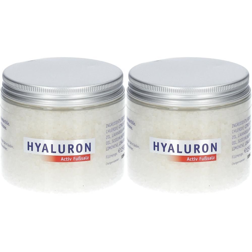 Zwei Gläser mit weißem Salz. Aufkleber mit "HYALURON Activ Fußsalz". Silberfarbene Deckel.