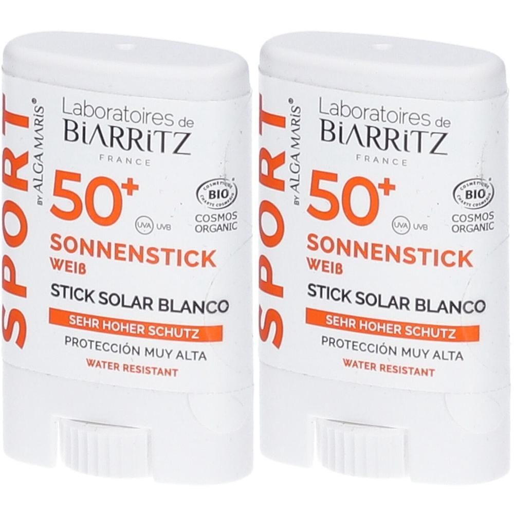 Zwei weiße Sonnensticks mit orangefarbener Schrift. Aufschrift: Laboratoires de Biarritz, 50+, Sonnenstick, Bio-Zertifizierung.