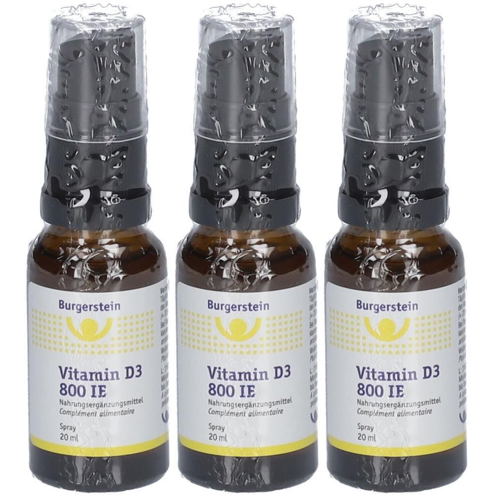 Drei Flaschen Burgerstein Vitamin D3 800 IE Spray. Braune Glasflaschen mit schwarzem Sprühkopf und Etikett. 20 ml.
