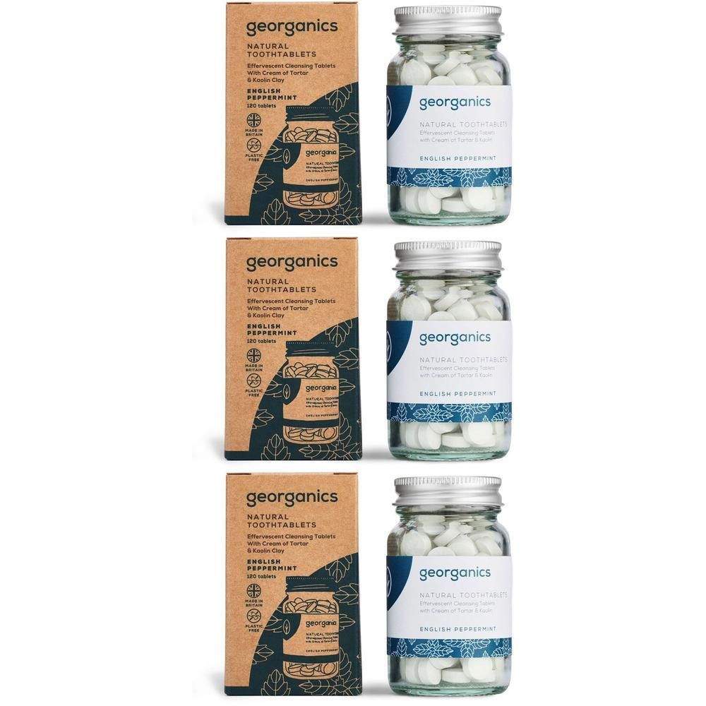 Drei Packungen und Gläser mit Tabletten. Aufschrift: georganics, Natural Tooth Tablets, Englische Pfefferminze.