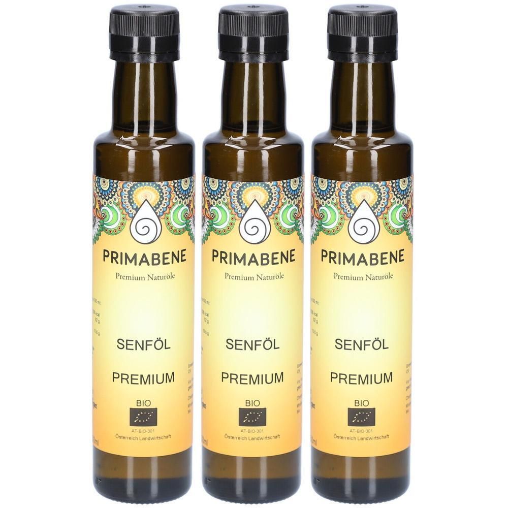 Drei braune Glasflaschen mit schwarzem Deckel. Auf den Etiketten steht „PRIMABENE Senföl Premium Bio“ und ein Bio-Siegel.