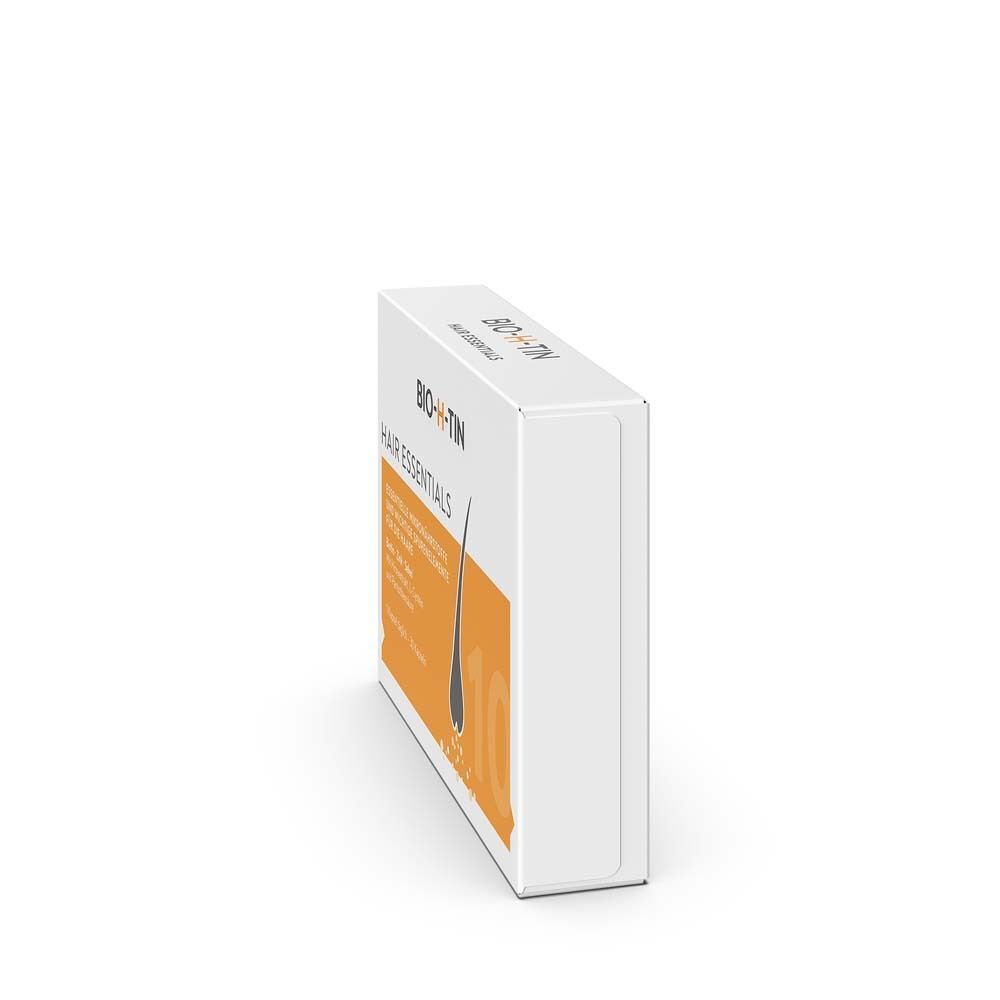 BIO-H-TIN® Hair Essentials Schachtel, Seitenansicht. Weiße Verpackung mit orangefarbenem Streifen und Produktnamen.