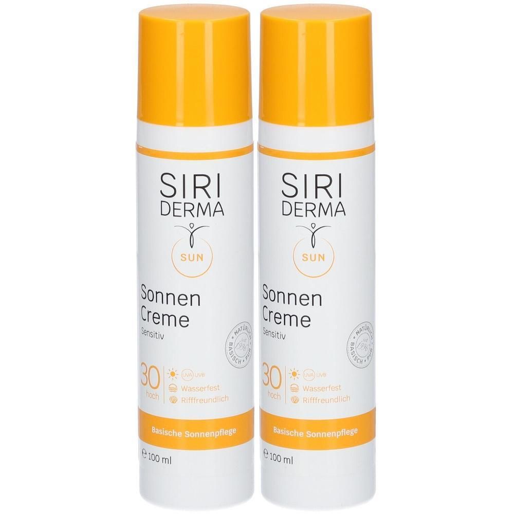 Zwei Flaschen SIRIDERMA Sonnencreme LSF 30, je 100ml. Weiße Flaschen mit orangefarbenen Kappen und Aufdruck.