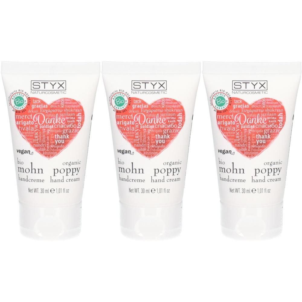 Drei Tuben STYX Mohn Handcreme Danke-Edition mit Herz-Design und Bio-Siegel.