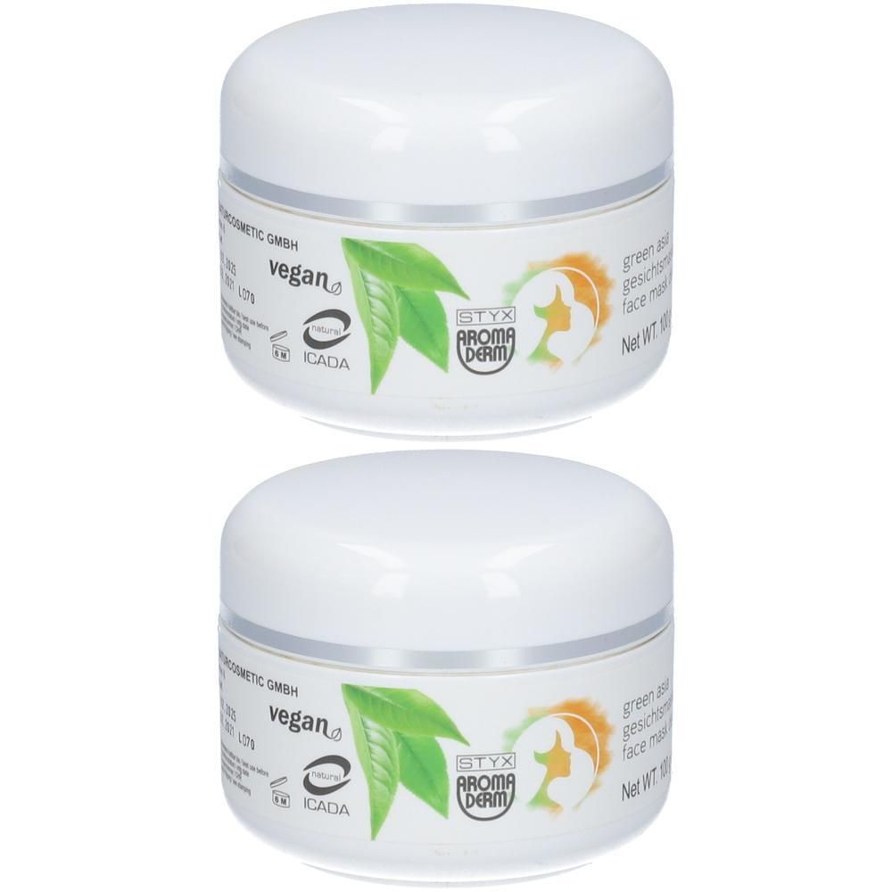 Zwei weiße Tiegel mit Deckel. Aufkleber mit Logo, Blättern und Schriftzug. Vegan-Siegel. STYX AROMADERM Green Asia Gesichtsmaske Detox.