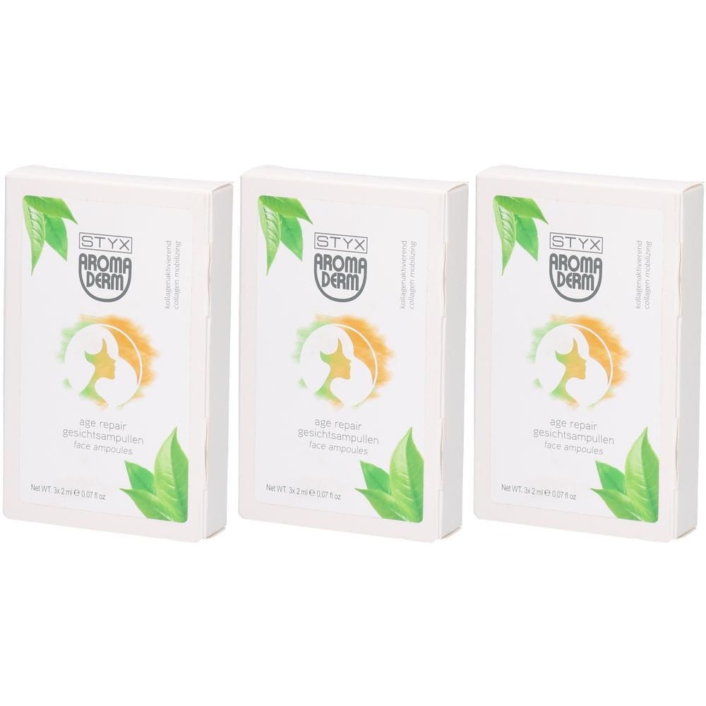 Drei weiße Kartons mit STYX AROMADERM Logo, grünen Blättern und Produktbezeichnung. Aufschrift: Age Repair Gesichtsampullen.
