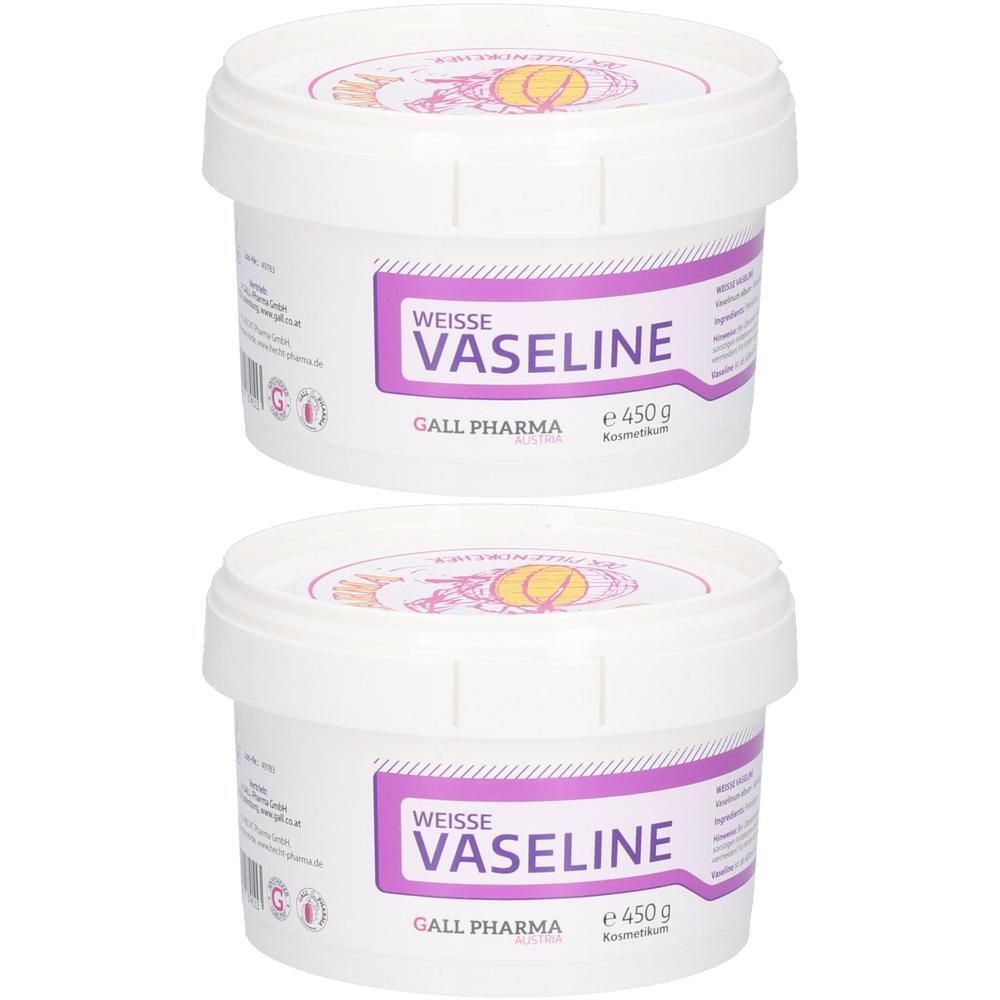 Zwei weiße Tiegel mit Deckel. Aufschrift: Weiße Vaseline, Gall Pharma. Lila Etikett mit Produktinformationen. Kosmetikprodukt.