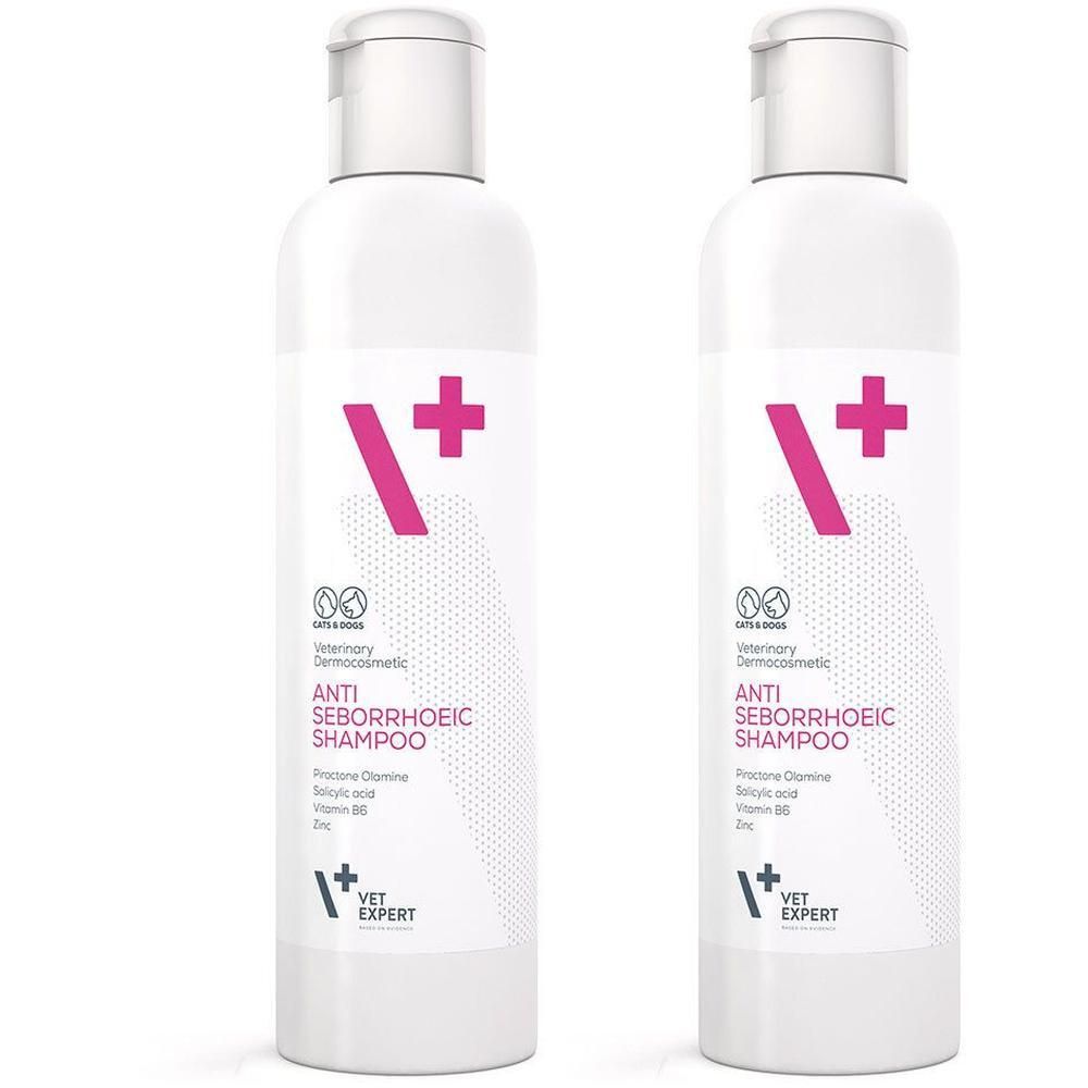 Zwei weiße Flaschen mit rosa Akzenten. Aufschrift: Anti Seborrhoeic Shampoo. Marke: VET EXPERT. Mit einem rosa Pluszeichen und Logo.