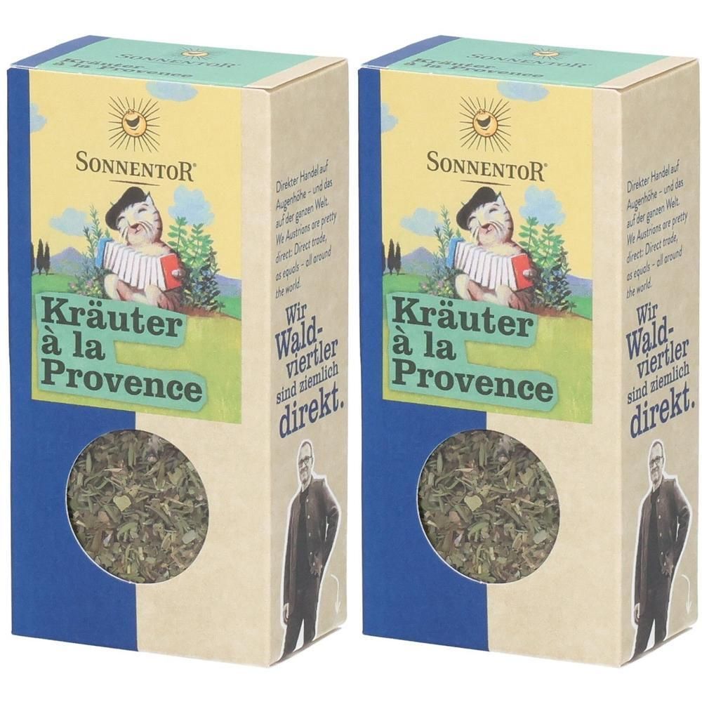 Zwei rechteckige Kartons mit Kräutern. Aufdruck: SonnentoR, Kräuter à la Provence. Sichtfenster mit Kräutern.