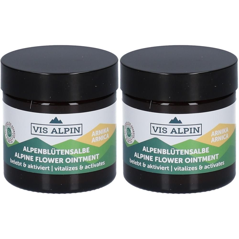 Zwei Tiegel VIS ALPIN Alpenblütensalbe Arnika. Schwarze Deckel, weiße Etiketten mit grünen und gelben Elementen. Text: Alpine Flower Ointment.