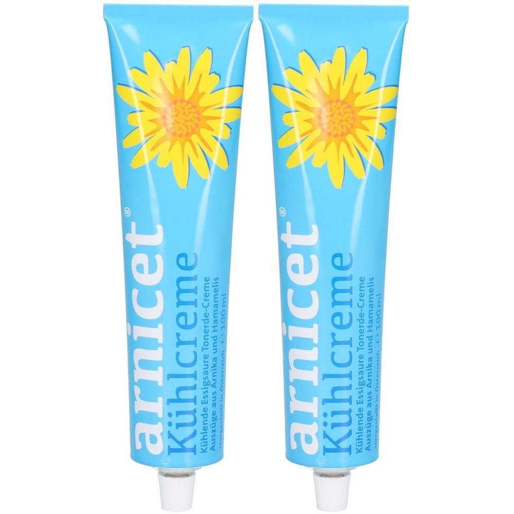 Zwei blaue Tuben mit gelben Blüten. Aufschrift: arnicet Kühlcreme. Enthält Auszüge aus Arnika und Hamamelis. Weiße Verschlusskappe.