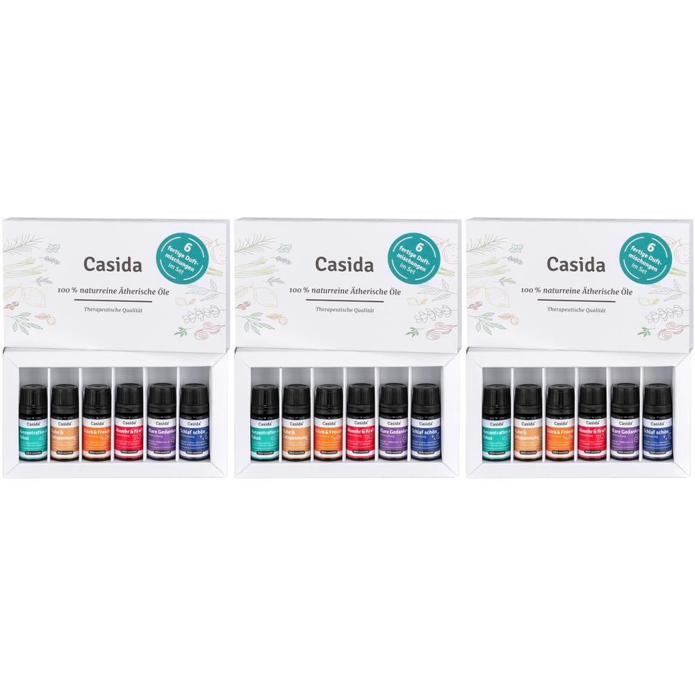 Drei Casida® Ätherische Öle Sets. Jedes Set enthält sechs kleine Flaschen in einer weißen Schachtel. Aufdruck: Casida, 100% naturreine Öle.