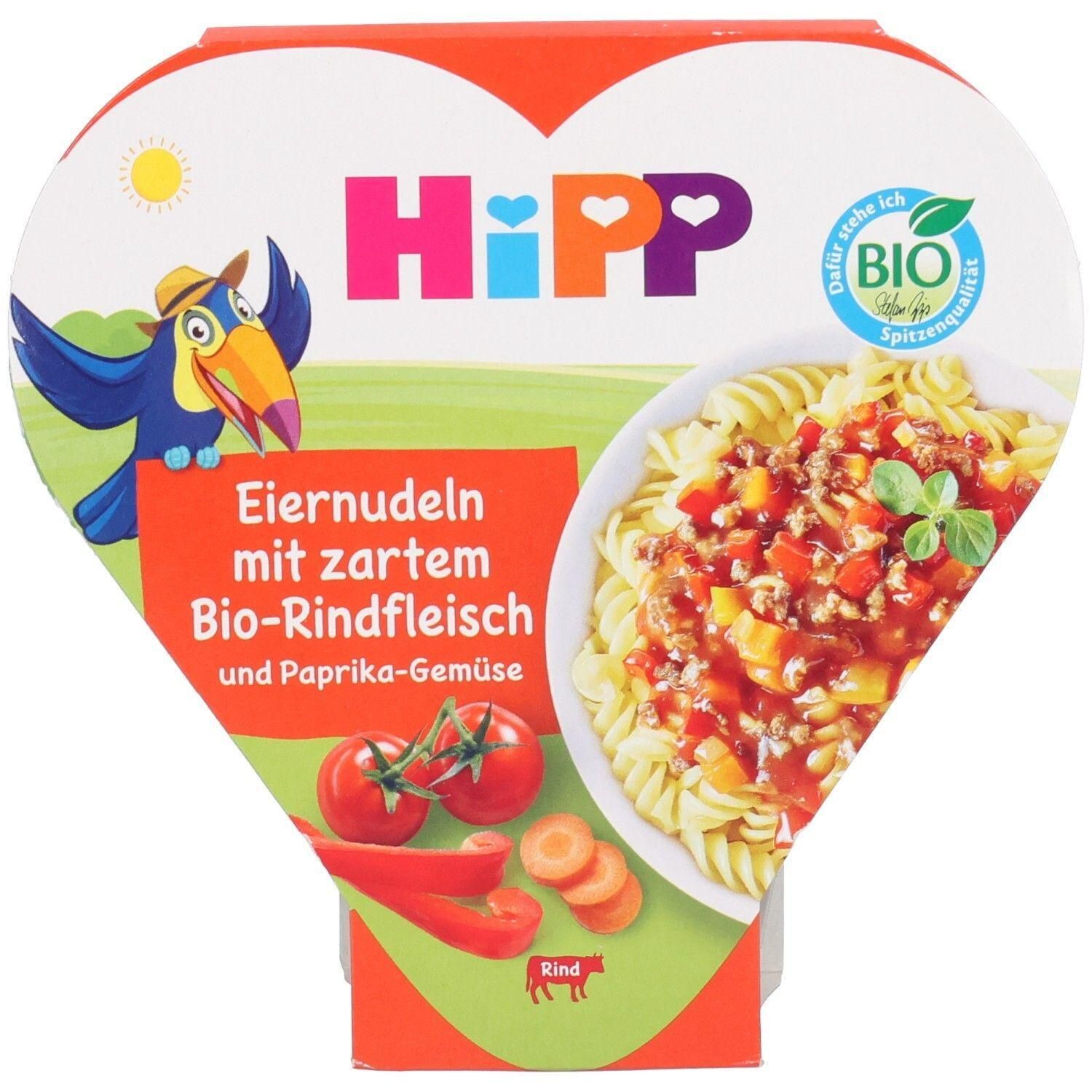 Verpackung mit HiPP Eiernudeln mit Bio-Rindfleisch und Paprika-Gemüse. Herzförmige Schachtel mit Produktabbildung und Bio-Siegel.