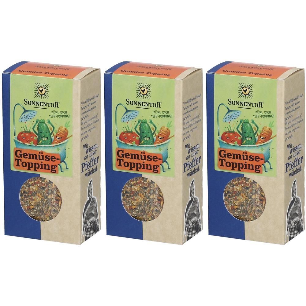 Drei Kartons mit SonnentoR Gemüse Topping. Aufdruck: Gemüse in Badewanne. Logo: Sonne. Sichtfenster mit Inhalt. Text: Pfeffer wächst.