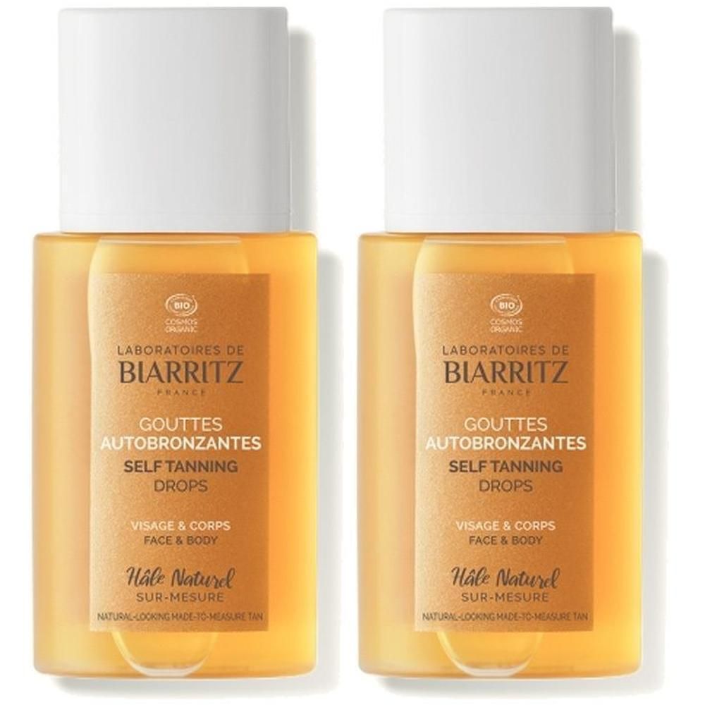 Zwei Flaschen Laboratoires de Biarritz Selbstbräunungstropfen mit weißem Deckel und Etikett.