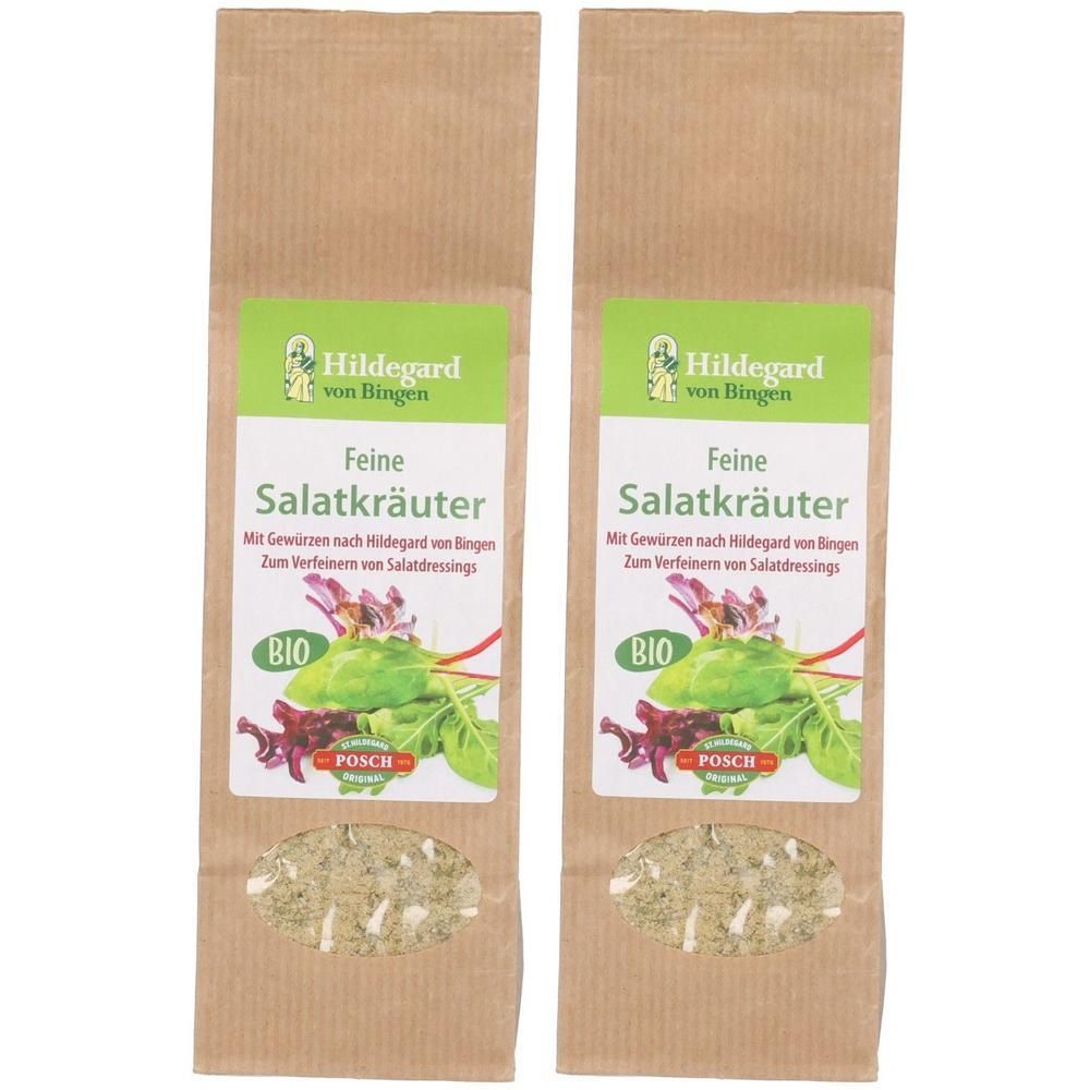 Zwei Beutel mit Salatkräutern. Aufdruck: Hildegard von Bingen, Feine Salatkräuter, BIO-Siegel. Sichtfenster mit Kräutern.