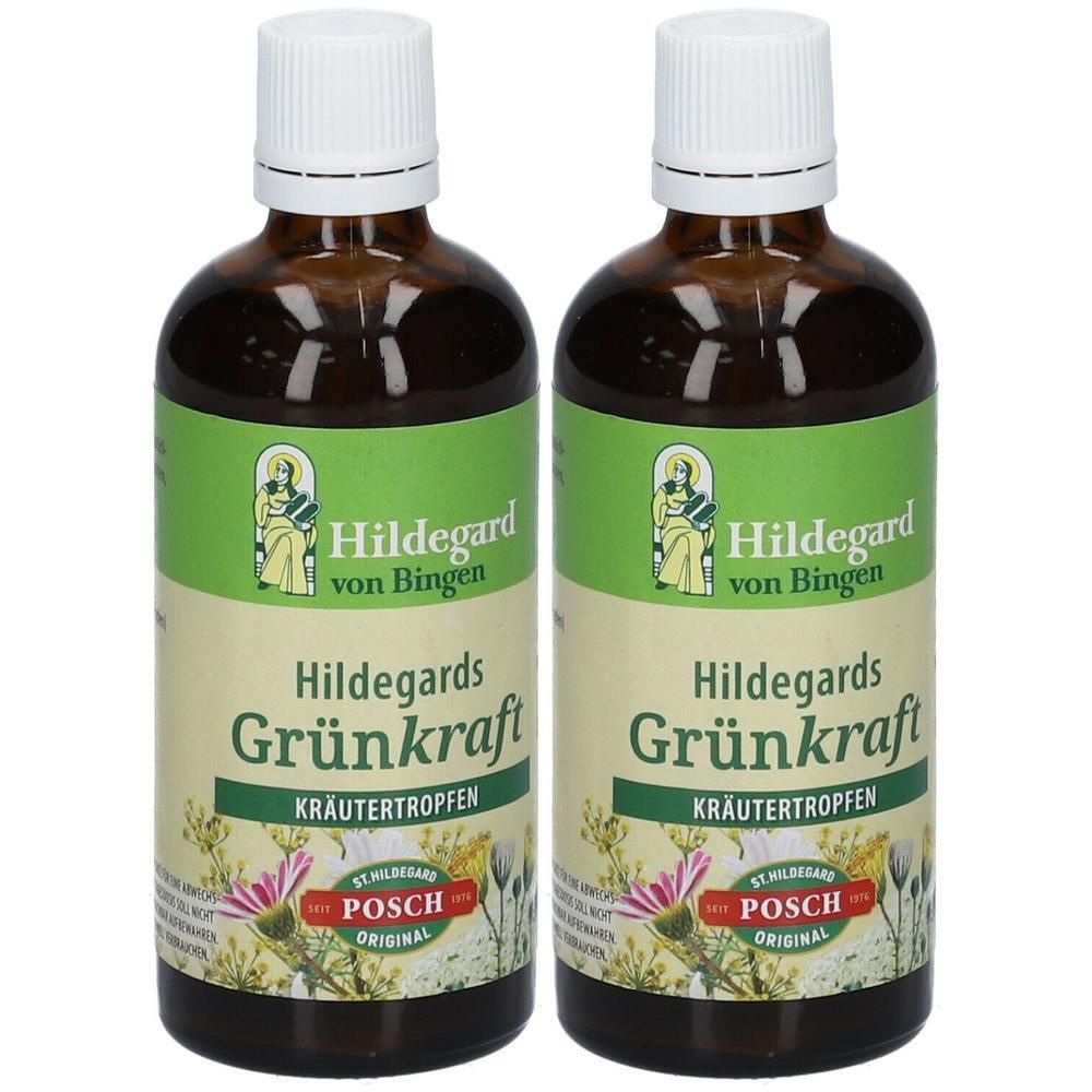 Zwei braune Glasflaschen mit weißem Verschluss. Auf den Etiketten steht "Hildegards Grünkraft Kräutertropfen".