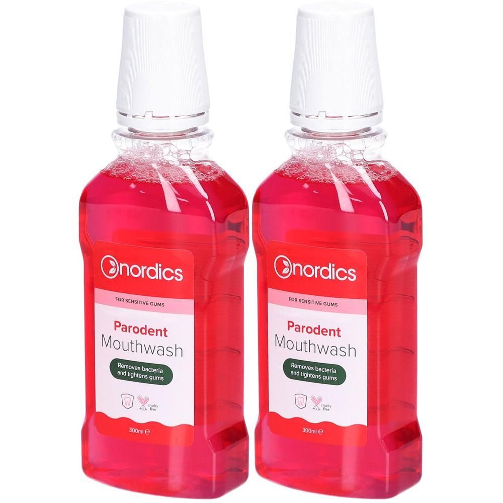 Zwei Flaschen Nordics Parodent Mundspülung, 300ml, mit roter Flüssigkeit.