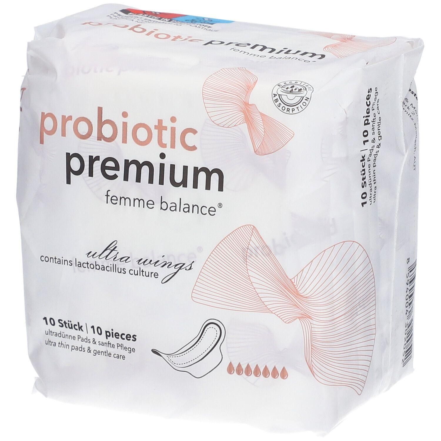 Verpackung mit Damenhygieneartikeln. Aufdruck: probiotic premium femme balance, ultra wings, 10 Stück. Mit Abbildung einer Binde.