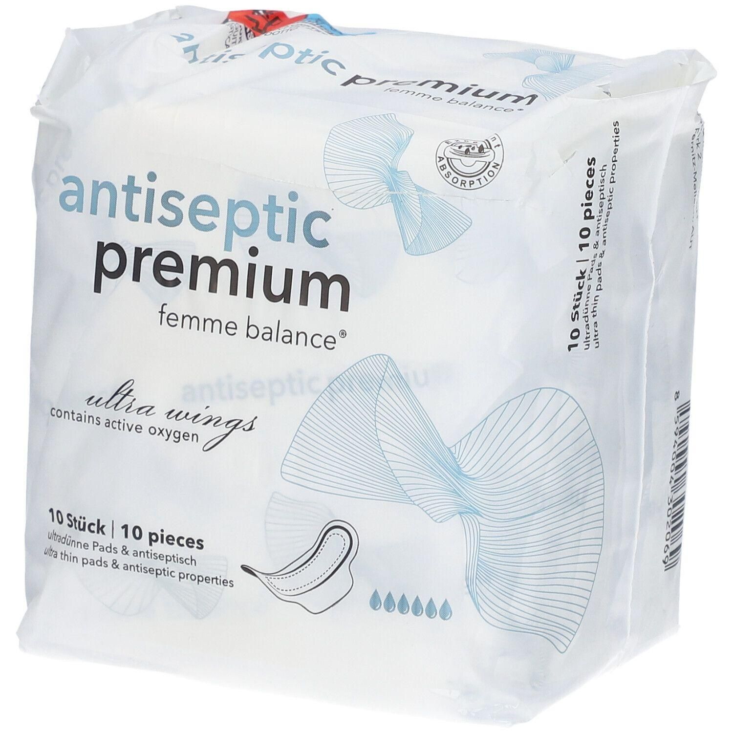Verpackung mit Damenbinden. Aufschrift: antiseptic premium femme balance ultra wings. 10 Stück. Dünne Pads mit antiseptischen Eigenschaften.