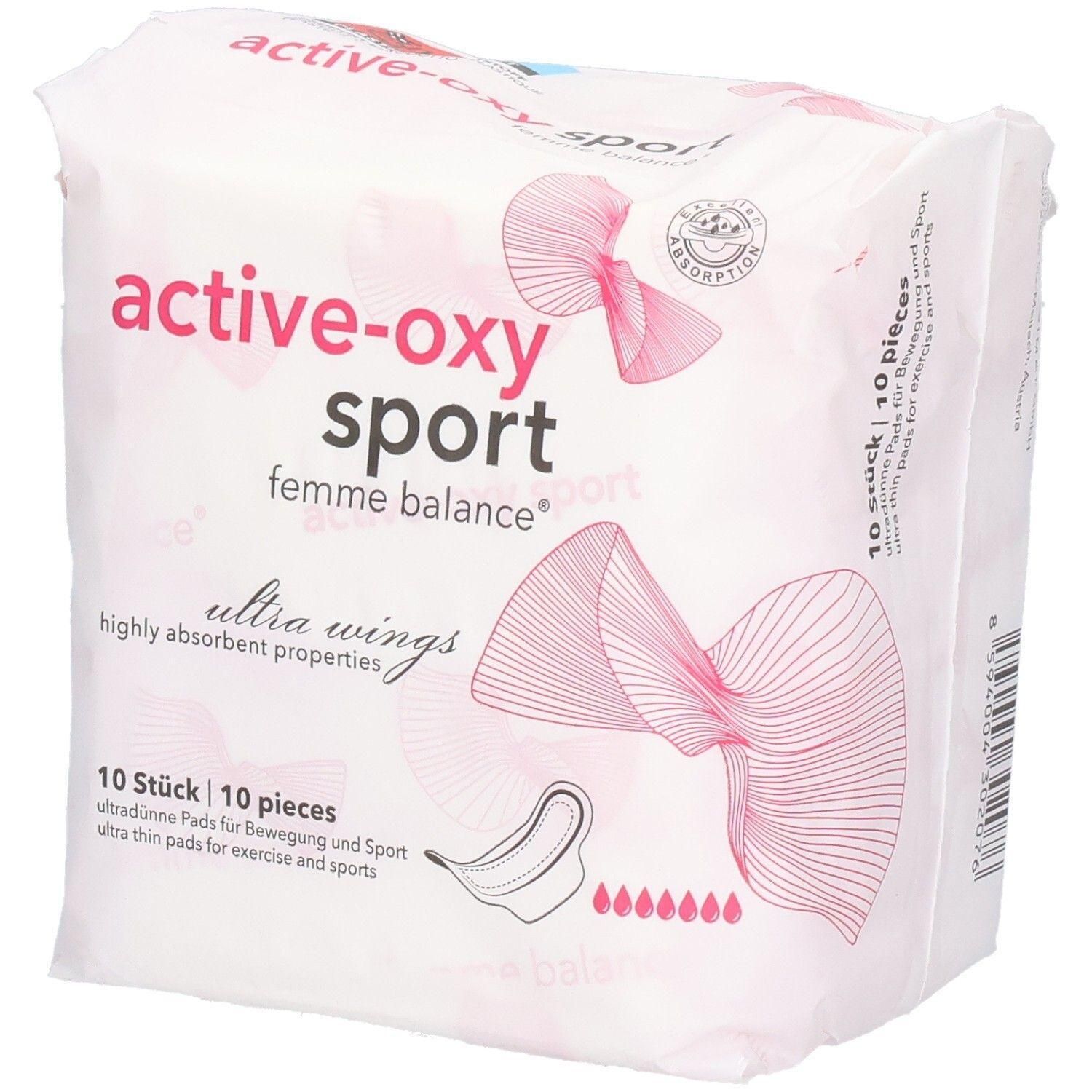 Verpackung mit Damenbinden. Aufschrift: active-oxy sport femme balance ultra wings. 10 Stück. Für Bewegung und Sport.