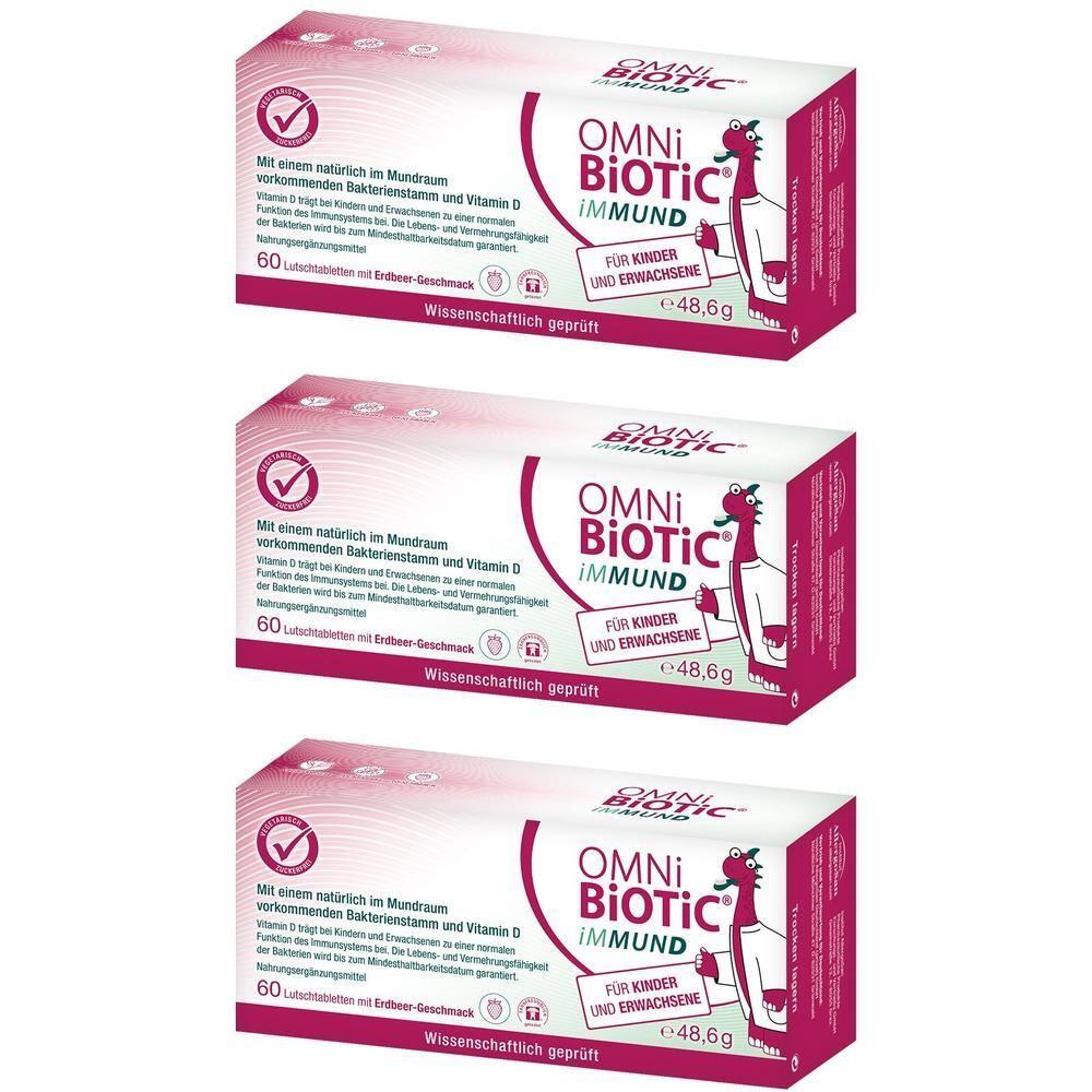 Drei Kartons OMNi-BiOTiC IMMUND. Weiß-rosa Verpackung mit Produktnamen und Illustration. Enthält 60 Lutschtabletten.