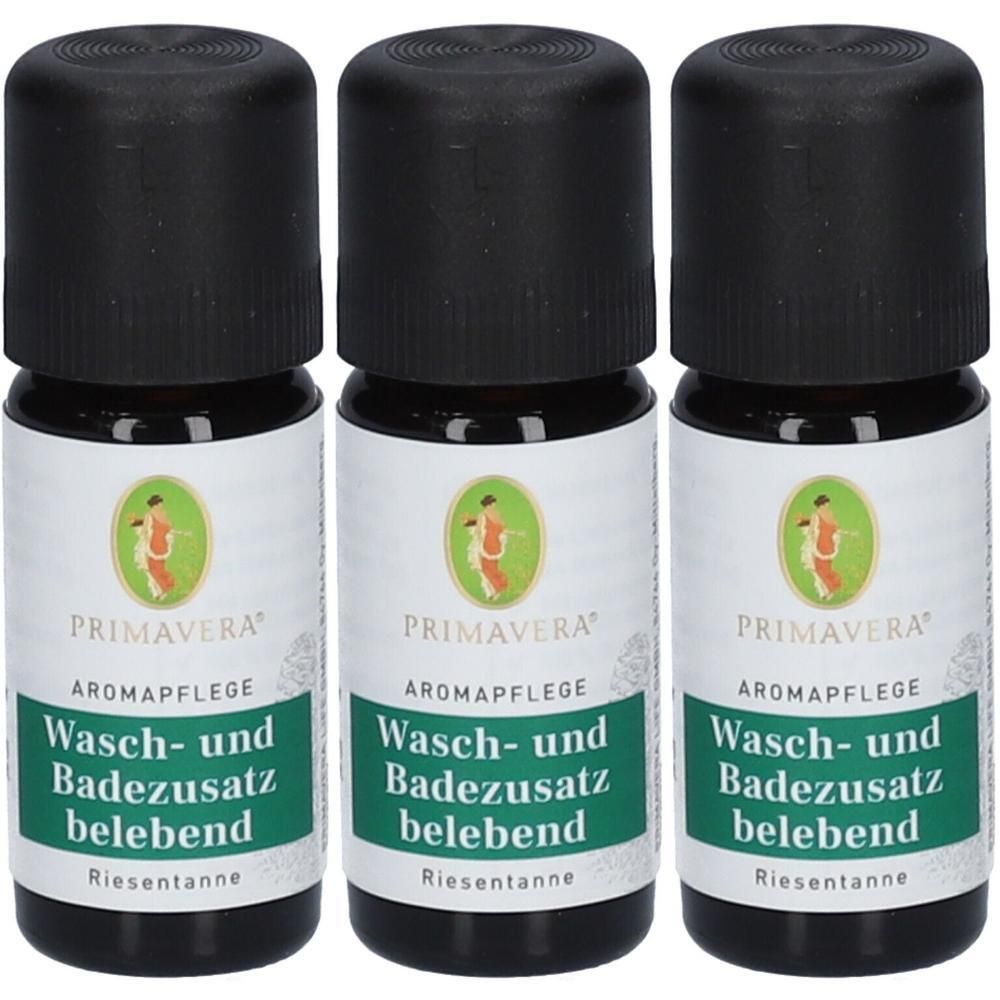 Drei PRIMAVERA Wasch- und Badezusatz belebend Fläschchen mit schwarzem Deckel und weißem Etikett.