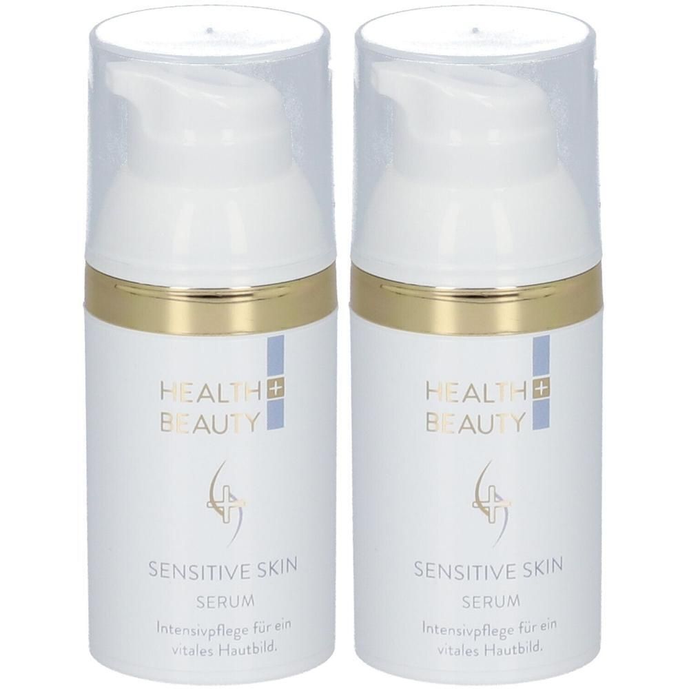Zwei weiße Serumflaschen mit goldenen Ringen und transparenten Deckeln. Aufschrift: Health & Beauty, Sensitive Skin Serum.