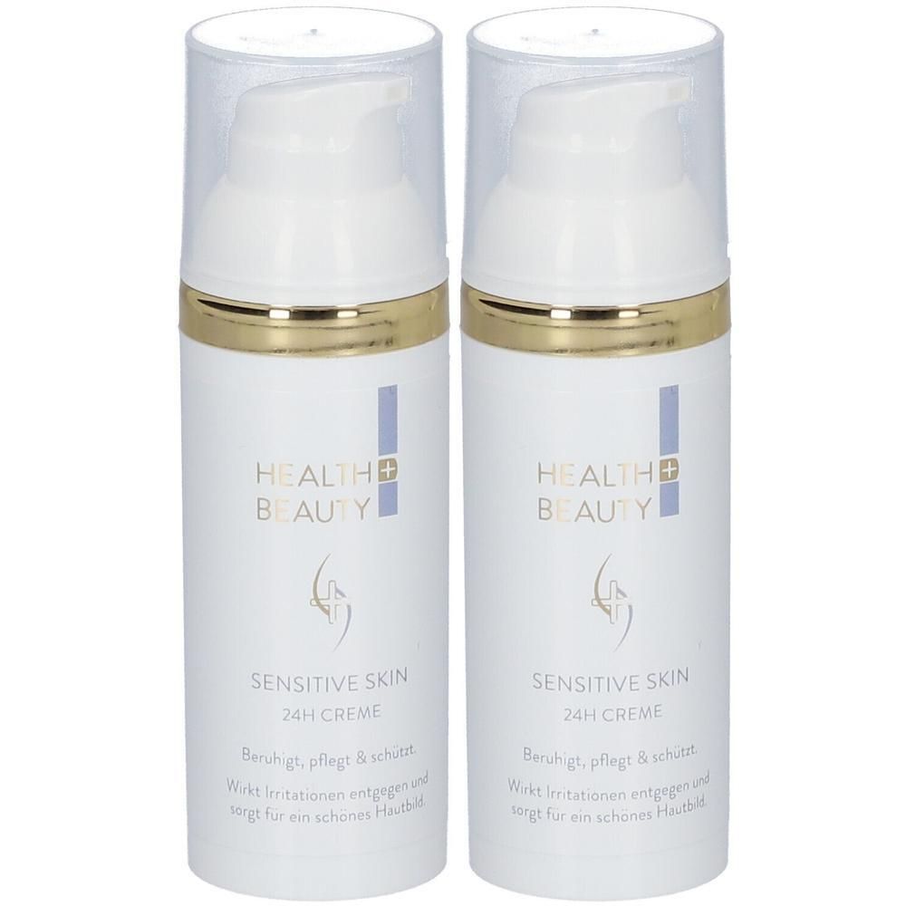 Zwei weiße Cremes mit goldenen Rändern und transparenten Deckeln. Aufschrift: Health & Beauty, Sensitive Skin 24h Creme.