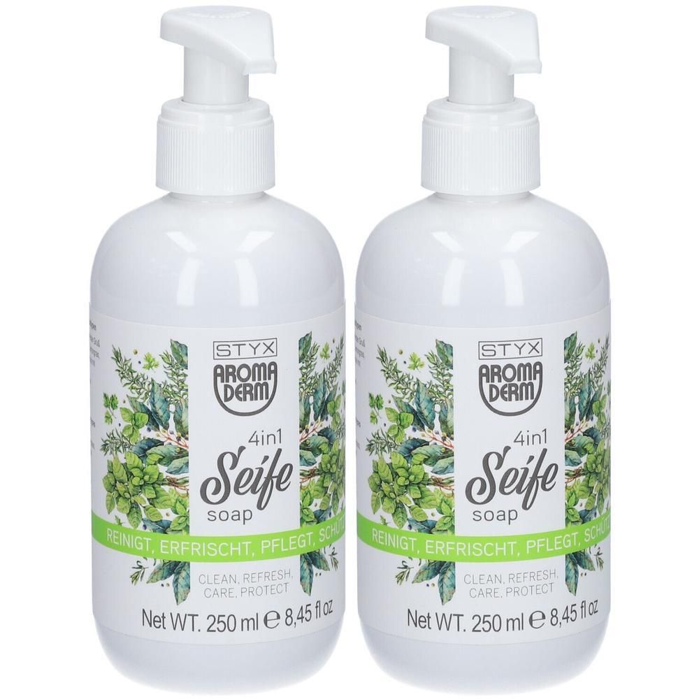 Zwei weiße Flaschen mit Pumpverschluss. Aufschrift: STYX Aroma Derm 4in1 Seife. Mit grünen Pflanzenmotiven und Text.