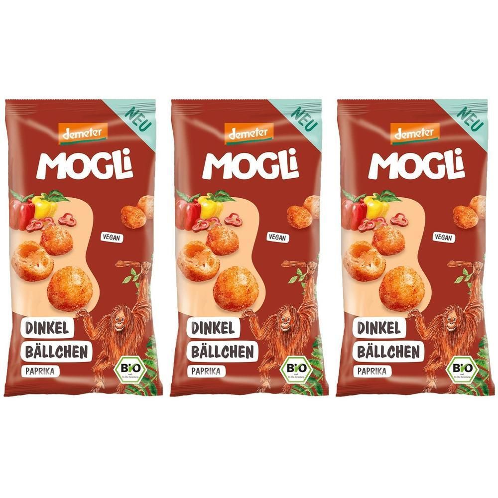 Drei Beutel Demeter MOGLi Dinkel Bällchen Paprika. Braune Verpackung mit Produktabbildung, Schriftzug und Bio-Siegel.