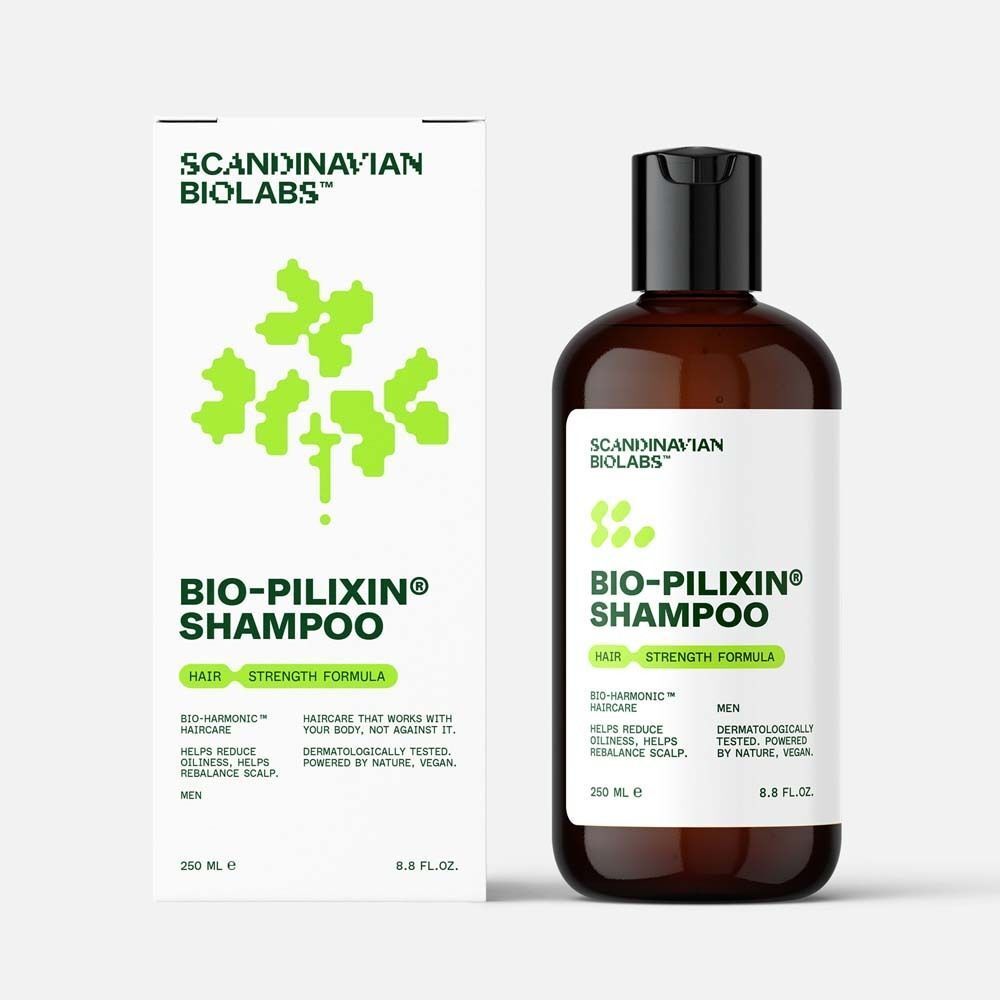 Braune Flasche und Verpackung. Flasche: BIO-PILIXIN Shampoo. Verpackung: Scandinavian Biolabs, grünes Logo, Text.