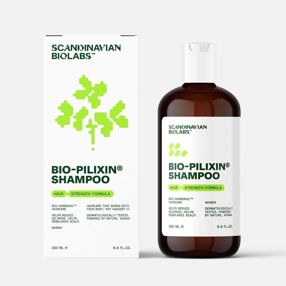 Eine braune Shampoo-Flasche neben einer weißen Verpackung. Produktname: Bio-Pilixin Shampoo. Text auf Verpackung und Flasche.