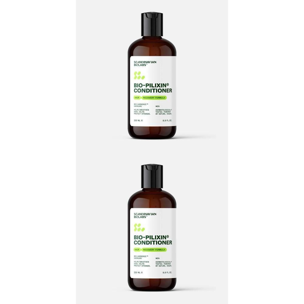 Zwei Flaschen Bio-Pilixin Conditioner. Braune Flaschen mit schwarzem Deckel und weißem Etikett. Text: Bio-Pilixin Conditioner.