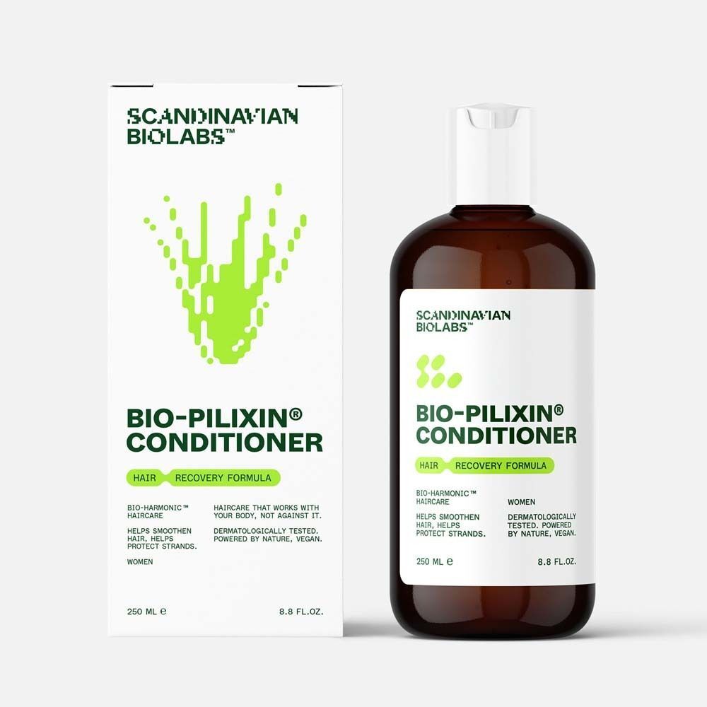 Bio-Pilixin Conditioner Flasche und Verpackung. Braune Flasche, weiße Verpackung mit grünem Logo und Schriftzug.