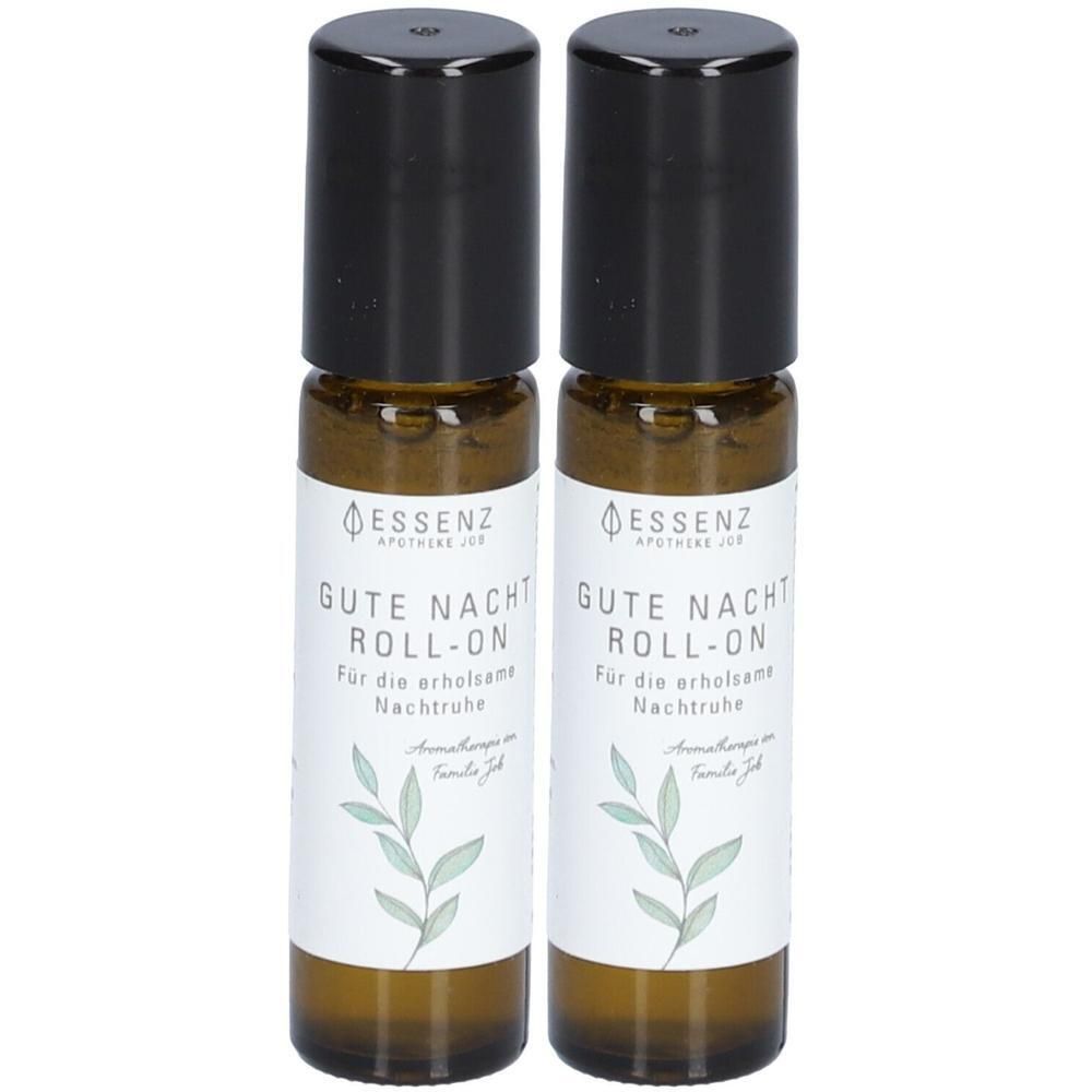 Zwei braune Glasflaschen mit schwarzen Roll-on-Applikatoren und Etiketten, die "GUTE NACHT ROLL-ON" zeigen.