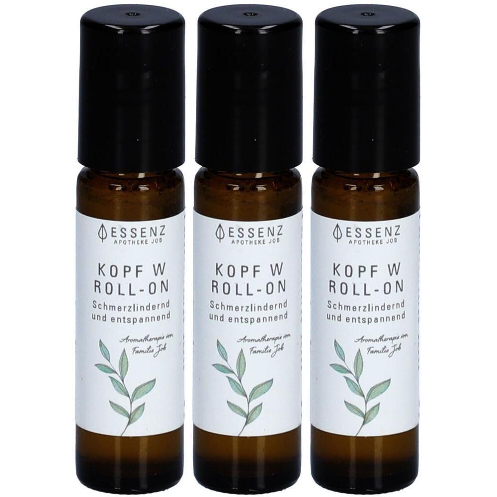 Drei ESSENZ KOPF W ROLL-ON Flaschen mit schwarzen Kappen und Etiketten, die Pflanzenmotive zeigen.