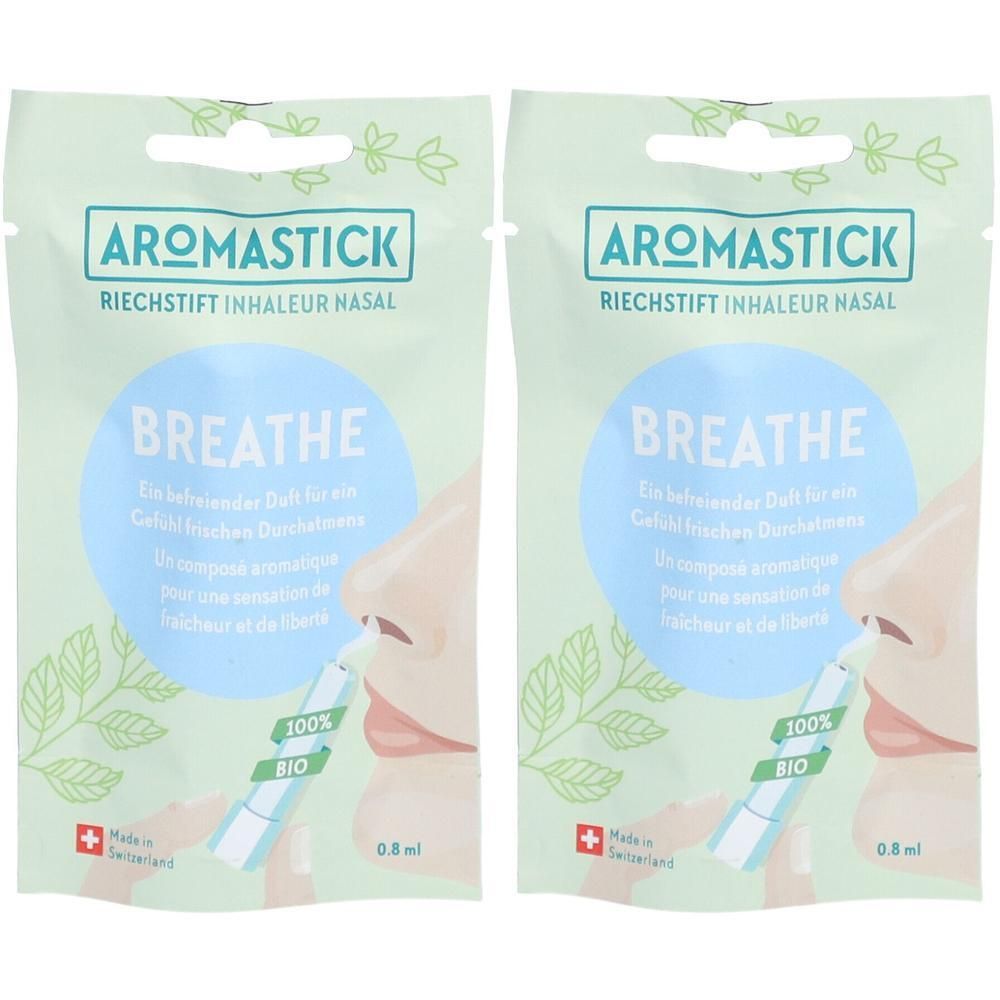 Zwei Beutel mit Nasen-Inhalatoren. Aufschrift: AROMASTICK BREATHE. Schweizer Kreuz und 100% BIO-Siegel.