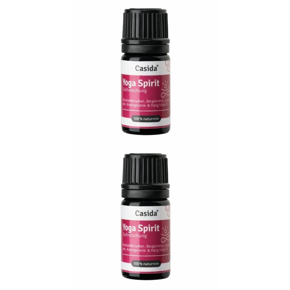 Zwei Flaschen mit schwarzem Deckel und Etikett. Aufschrift: Casida Yoga Spirit. Etikett mit Text und Logo. 100% naturrein.