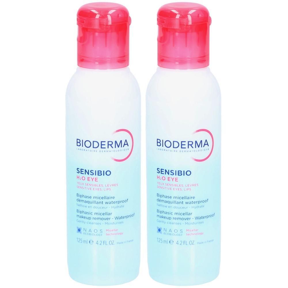 Zwei Flaschen mit rosa Deckel. Aufschrift: BIODERMA, SENSIBIO H2O EYE. Biphasic micellar makeup remover. 125 ml.