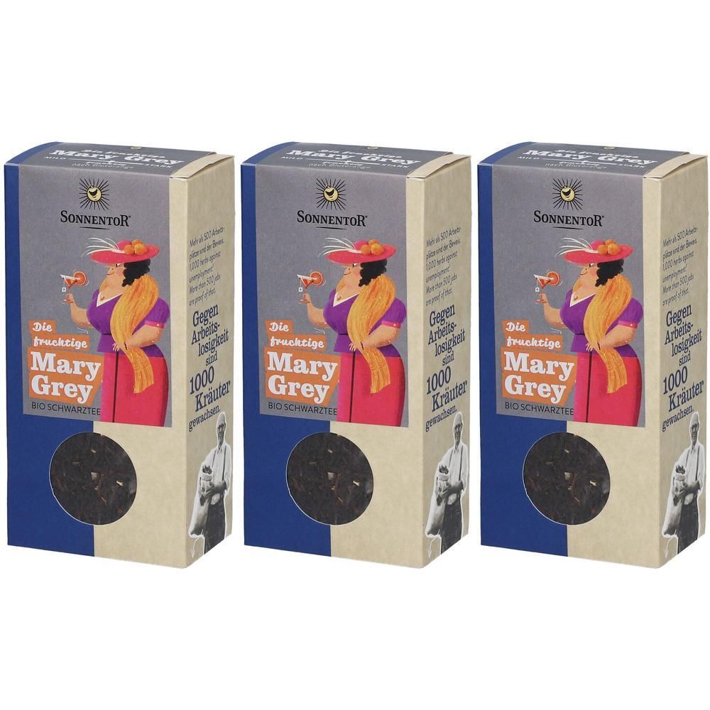 Drei rechteckige Kartons mit dem Aufdruck "Die fruchtige Mary Grey". Auf den Kartons ist eine Illustration einer Frau mit Hut abgebildet.