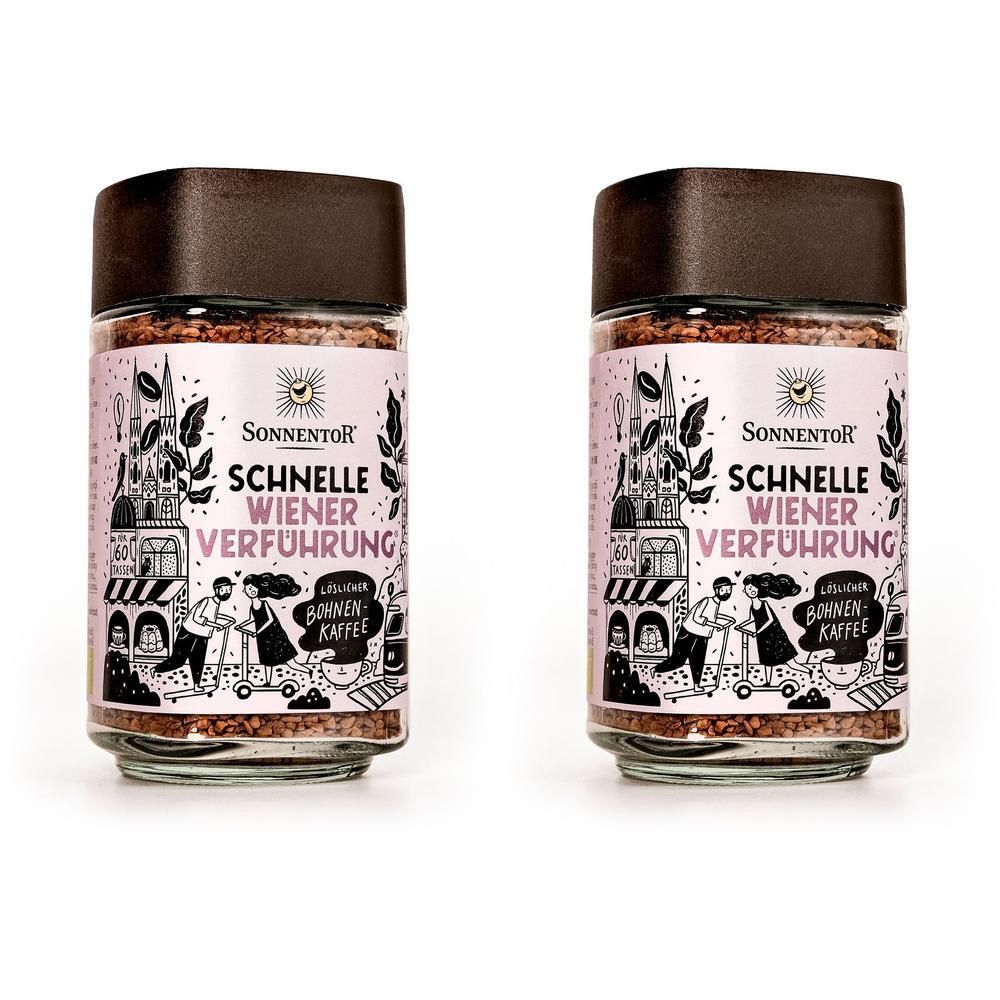 Zwei Gläser SonnentoR Schnelle Wiener Verführung. Glasbehälter mit braunem Deckel und rosa Etikett mit Illustrationen und Text.