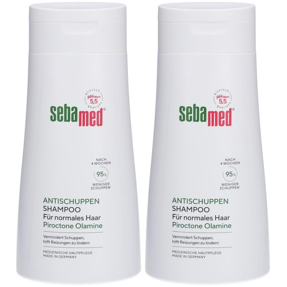 Zwei weiße Flaschen Shampoo mit Klappverschluss. Aufschrift: sebamed, ANTISCHUPPEN SHAMPOO, pH 5.5. Für normales Haar. Medizinische Hautpflege.