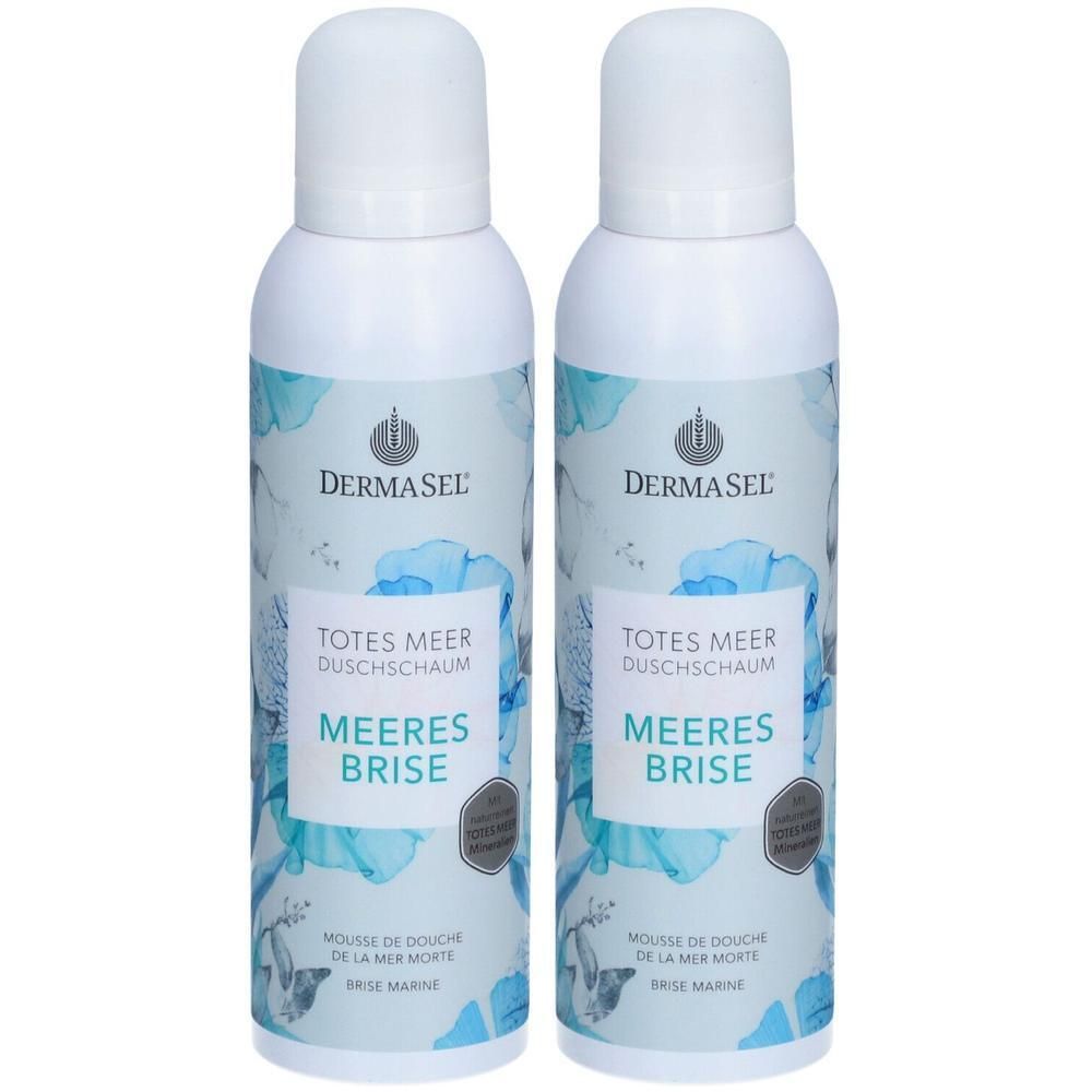Zwei weiße Sprühflaschen mit blauer floraler Gestaltung. Aufschrift: DERMASEL, Totes Meer Duschschaum, Meeres Brise.