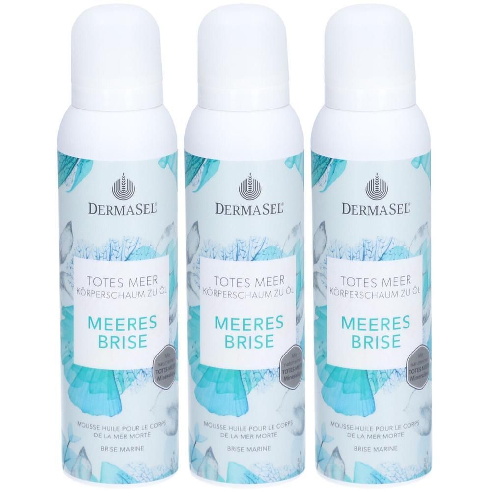 Drei weiße Sprühflaschen mit blau-grünen Verzierungen. Auf jeder Flasche steht "DERMASEL TOTES MEER Körperschaum zu Öl Meeresbrise".