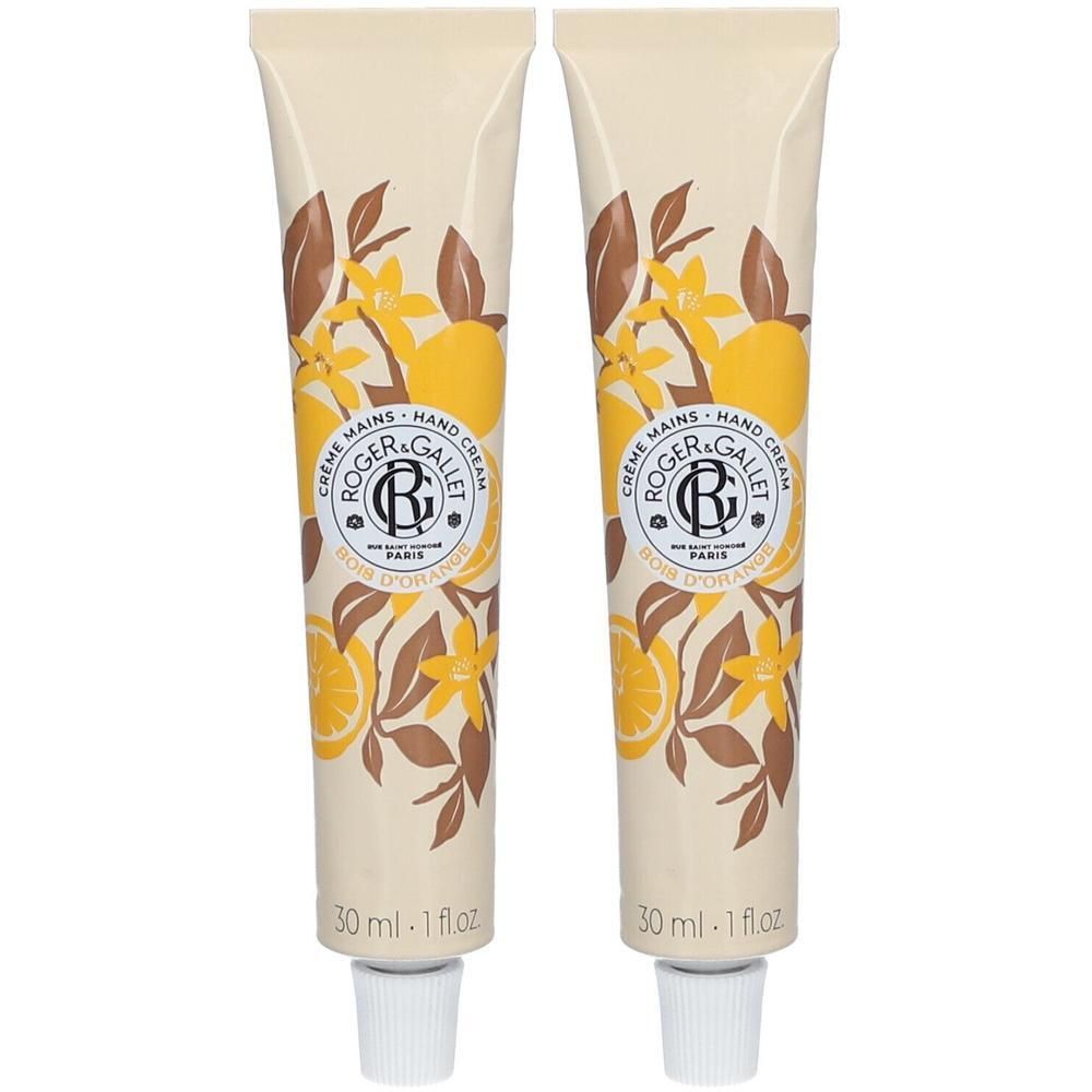 Zwei Tuben Handcreme. Beige Grundfarbe mit gelben Orangen und braunen Blättern. Aufschrift: ROGER & GALLET, Bois d'Orange, 30 ml.