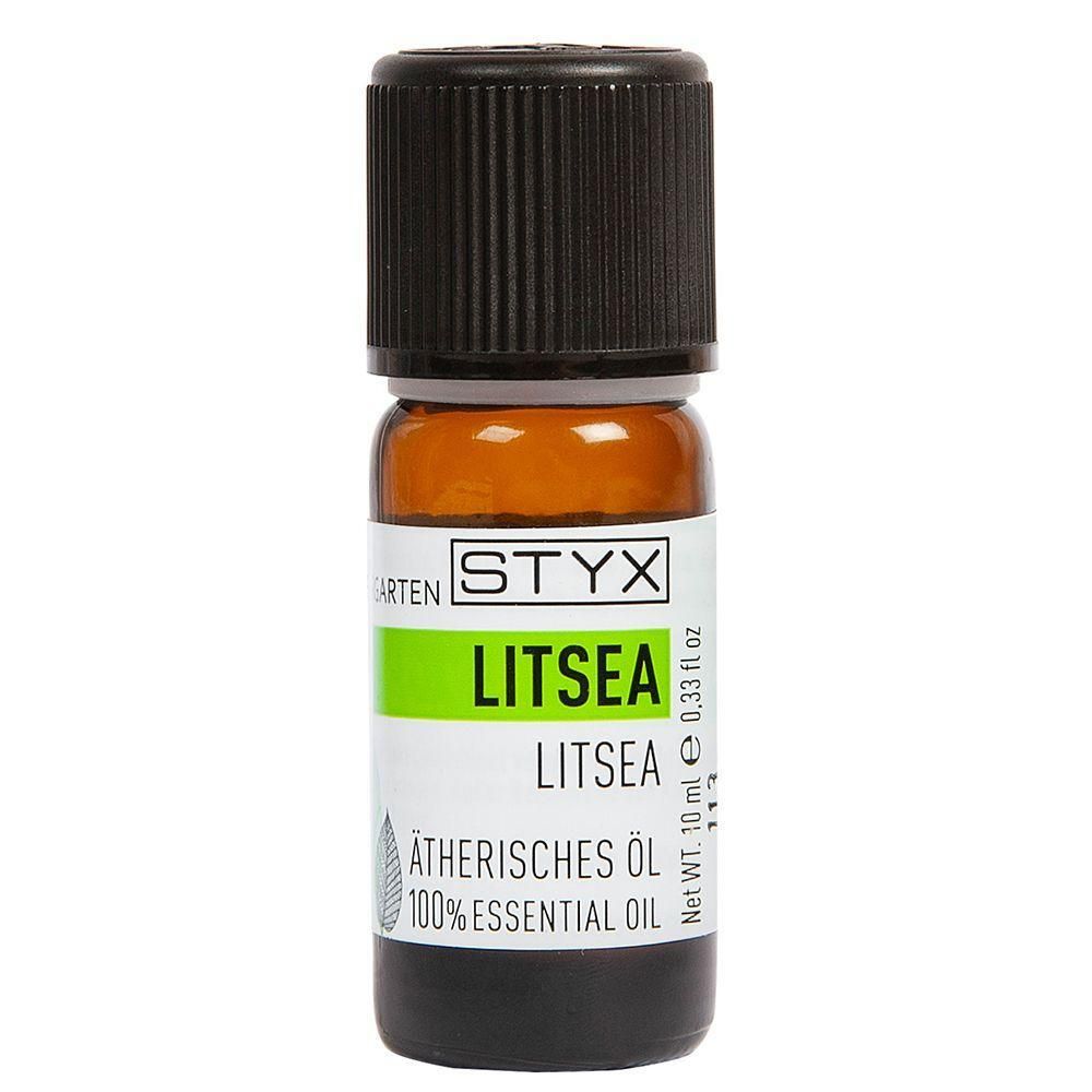 Braune Glasflasche mit schwarzem Deckel. Etikett mit STYX, LITSEA und „Ätherisches Öl“. 100% Essential Oil.